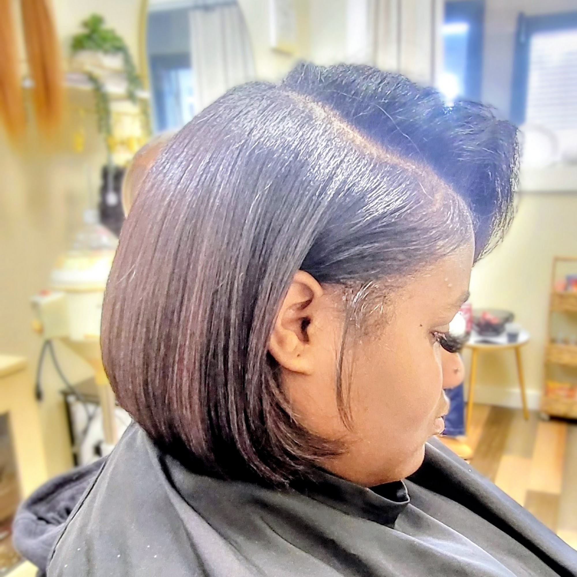 HER HAIR IS