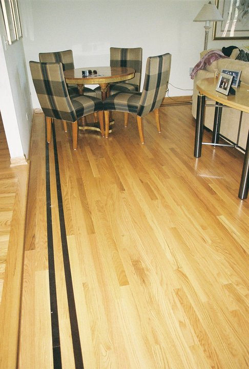 A Sure-Wood Flooring Co