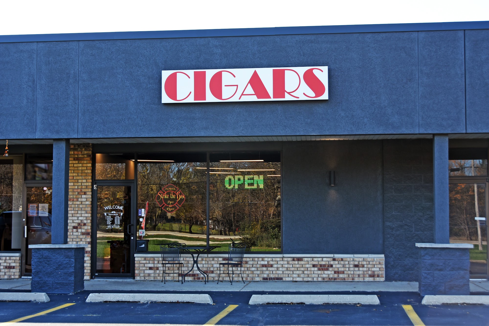 Strike The Box Pipes and Cigars Rockford