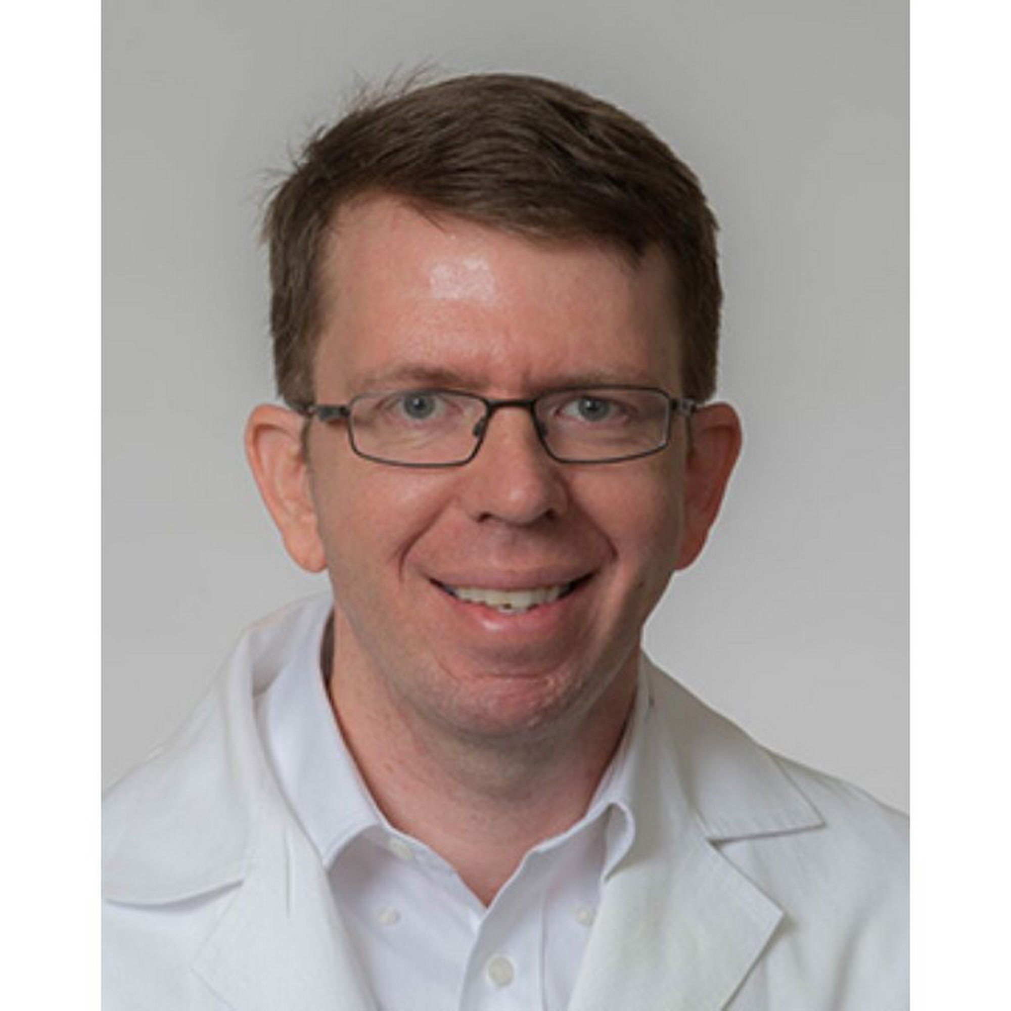 Charles E. Degravelles, MD