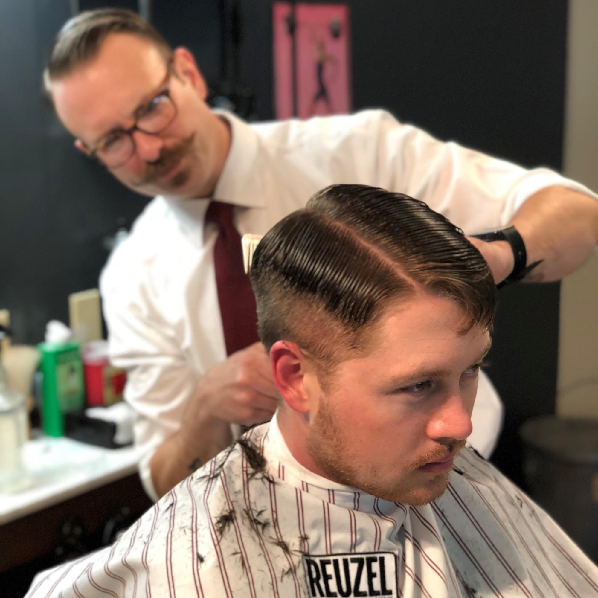 The Slow Down Barbershop and Lounge