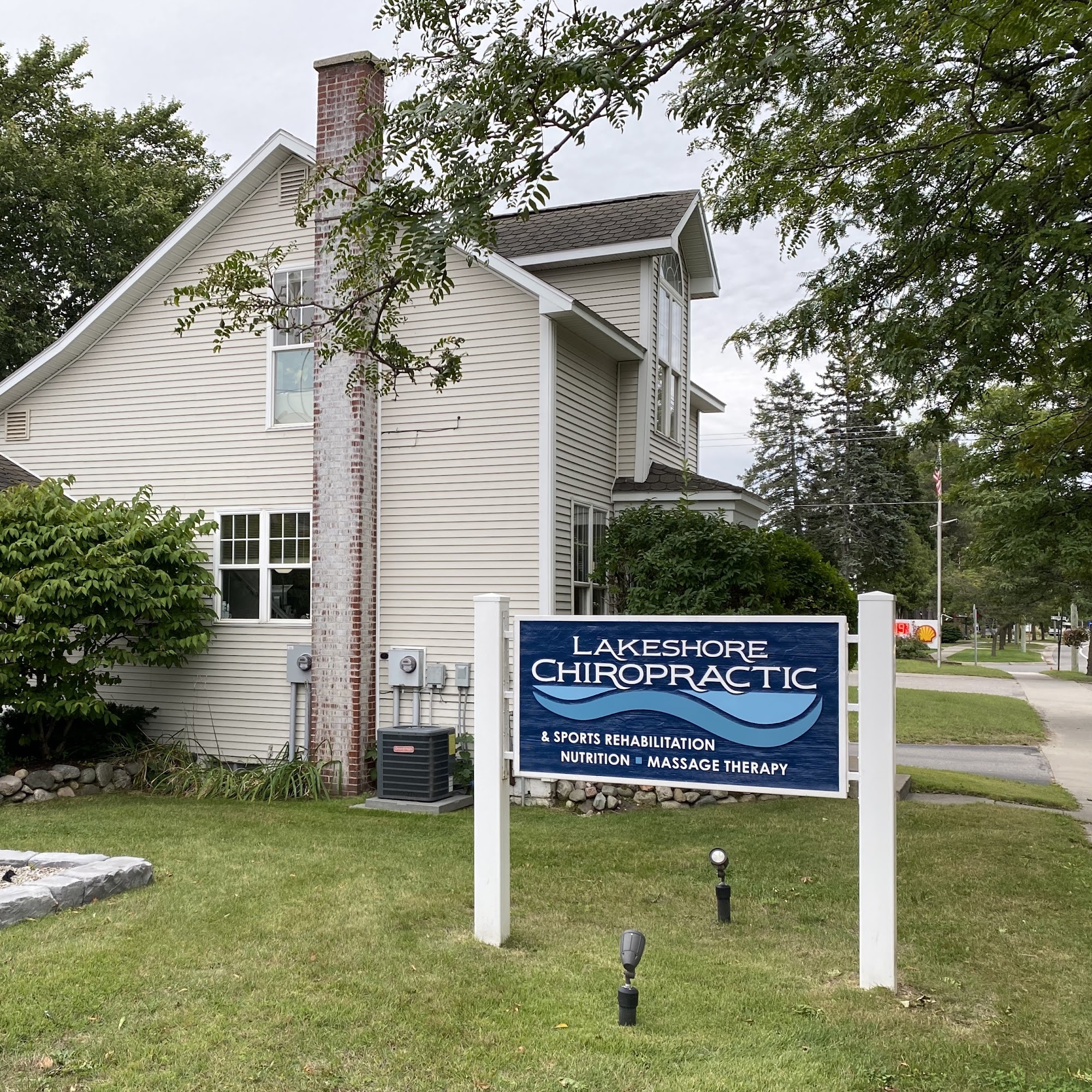 Lakeshore Chiropractic and Sports Rehabilitation: Wilkin Aaron D DC 1302 Bridge St, Charlevoix Michigan 49720