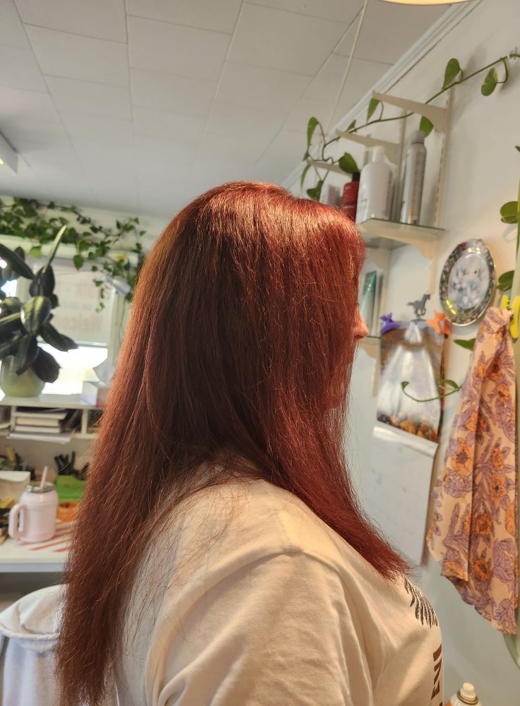 Top Knotch Hair Styling