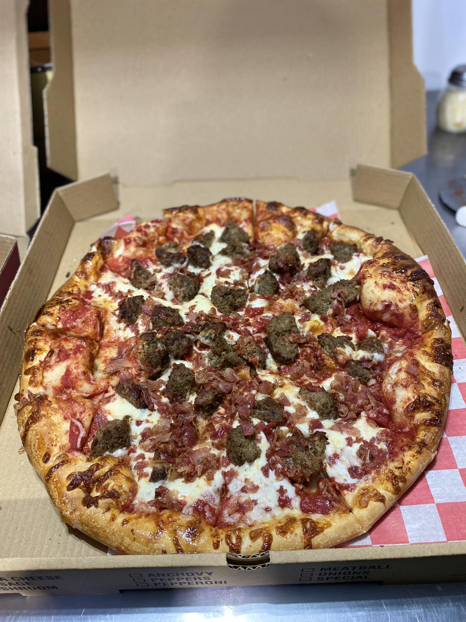 Howell's Pizza & Subs